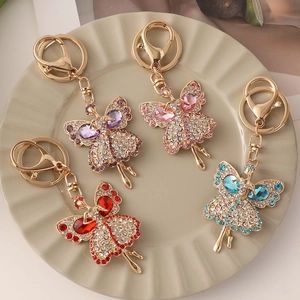 Portachiavi ballerina con strass in viola, rosa, rosso e blu su vassoio ceramico