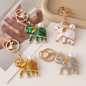 Exquisite elephant keychains in enamel finish with rhinestones and faux pearl details