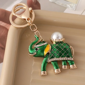 Enamel elephant keychain with white faux pearl and rhinestones on gold tray
