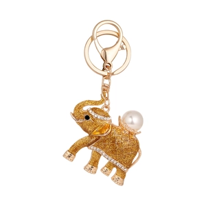Sparkling elephant keychain with gold glitter finish, rhinestones and pearl accent