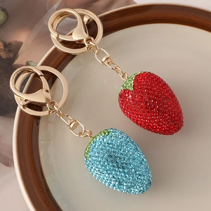 Creative strawberry keychain set with sparkling rhinestones in red and blue colors