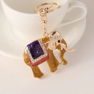 Colorful elephant keychain with gold plating, sparkling rhinestones and purple enamel finish