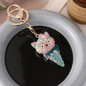 Cartoon cat ice cream keychain with white rhinestones and gold hardware decoration