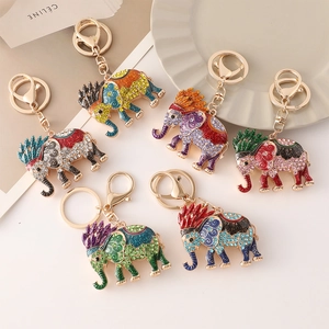 Southeast Asian elephant keychains with colorful rhinestones and enamel patterns