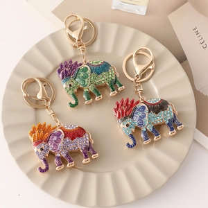 Elegant gold-plated elephant keychain with colorful rhinestones and enamel details