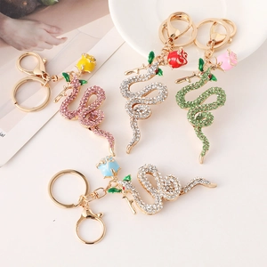 Sparkling snake and rose crystal keychains in four colors with gold lobster clasps