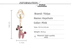 Detailed view of pink rhinestone giraffe keychain with dimensions 12.5 x 4.4 cm and 35.6g weight