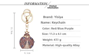Detail showing ladybug keychain dimensions 11.3cm x 4.1cm with purple and white crystals