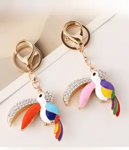 Détails de porte-clés toucan colorés avec strass brillants et finitions en alliage doré