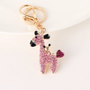 Pink rhinestone encrusted giraffe keychain with gold alloy lobster clasp and ring