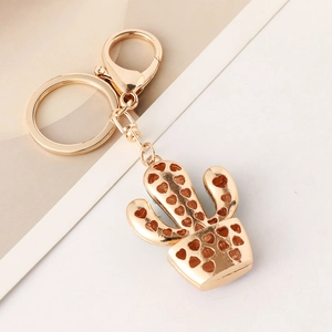 Golden cactus keychain with heart patterns, lobster clasp, and a luxury metallic finish