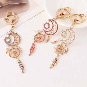 Colorful rhinestone moon dreamcatcher keychains in gold alloy with feather pendants