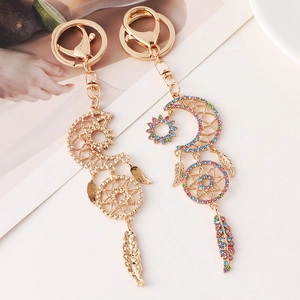 Golden moon and sun dreamcatcher keychain set with colorful rhinestones and feathers
