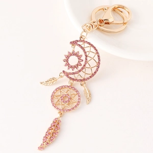 Pink rhinestone moon dreamcatcher keychain with golden feathers and sun charm