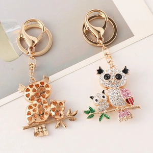 Porte-clés hibou scintillant en alliage doré avec des strass roses et blancs brillants
