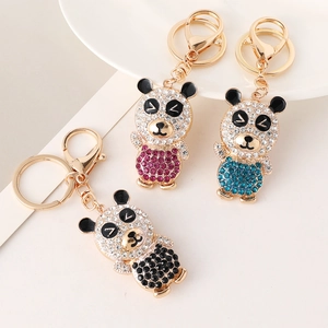 Exquisite rhinestone panda car keychains in purple, blue, and black with golden plating