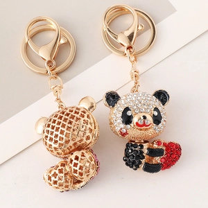 Charmante Panda-Schlüsselanhänger-Set mit goldenem Metall und funkelnden Strasssteinen