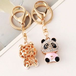 Sparkly rhinestone panda keychain with gold lobster clasp and white crystal stones