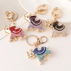 Set of four crown elephant keychains with enamel and sparkling rhinestones for bags