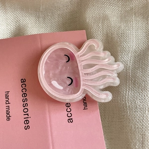 Simpatica clip per capelli a medusa rosa con trama in madreperla e base a mano