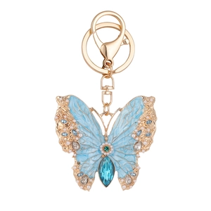 Elegant gold-plated butterfly keychain with blue enamel inlay and sparkling rhinestones
