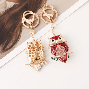 Colorful owl keychain with sparkling pink rhinestones and gold alloy metal details