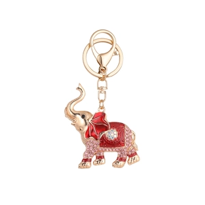 Golden elephant keychain with pink rhinestones and red enamel for bags and accessories