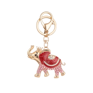Exquisite gold elephant keychain with red enamel, sparkling rhinestones and crown detail