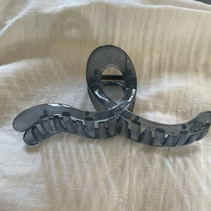 Translucent dark grey large acrylic hair claw clip for thick hair styling