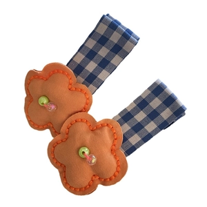 Floral candy color hair clips with orange fabric petals and gingham ribbon for girls