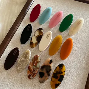 Elegant 15-piece set of acetate oval hair clips in various solid and tortoiseshell patterns