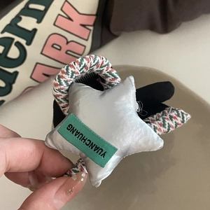 Y2K style star hair clip with colorful braided rope and silver satin star charm for women