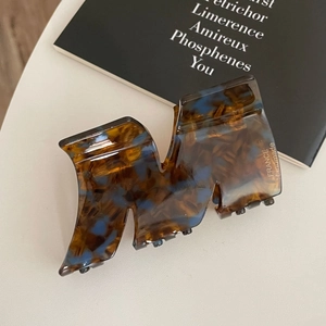 Handmade acetate large shark clip with elegant amber marble texture and M-shape design