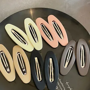 Matte oval hair clips set in Morandi colors including black beige and pink for women