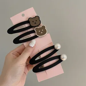 Retro teddy bear and pearl BB hair clip set for women featuring four matte black hairpins