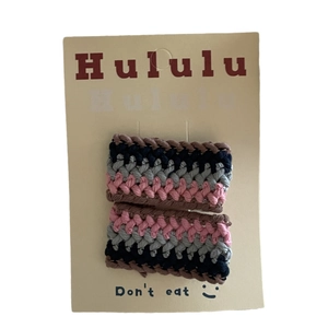 Handmade rainbow knitted hair clips with colorful striped patterns in a 2-piece set