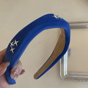 Klein blue velvet sponge headband with sparkling rhinestone stars for elegant hair styling