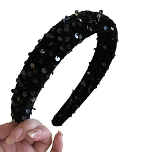 Elegant thick headband with black sequins and fabric wrap for stylish hair styling
