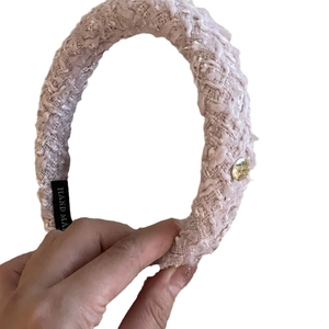 Pink tweed padded headband with gold metal button and handmade label for women
