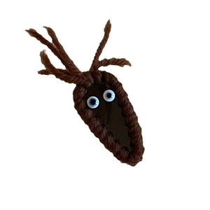 Handmade brown knit hair clip with cute cartoon eyes and decorative deer antlers