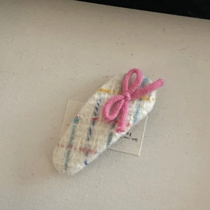 Korean style checkered hair clip with pink crochet bow on a white background card