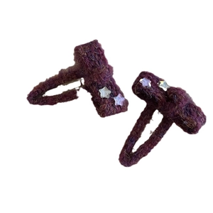 Set of two purple knitted bow hair clips with star sequins for toddlers and girls