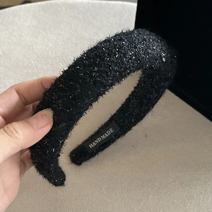 Elegant black tweed padded headband with silver glitter and handmade woven fabric texture
