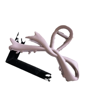Pinza per capelli rosa opaco a forma di fiocco con design a denti incrociati da donna