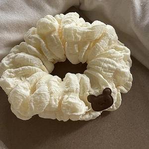 Cute teddy bear cream scrunchie with bubble textured fabric and elastic hair tie