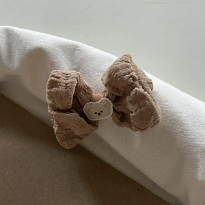 Cute brown bow hair scrunchie with bear embroidery in a minimalist Korean style
