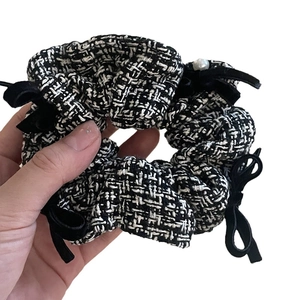 Elegant black and white tweed scrunchie with velvet bows and a pearl accent