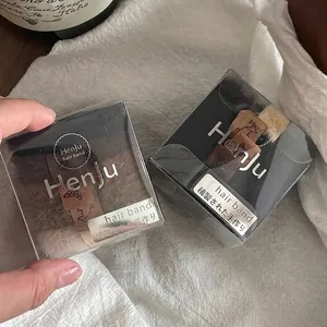 Elastic hair ties set in black and brown, handmade minimalist ponytail holders in a clear box