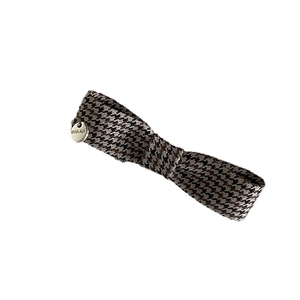 Vintage brown houndstooth bow hair clip with a round silver MORAVA metal pendant