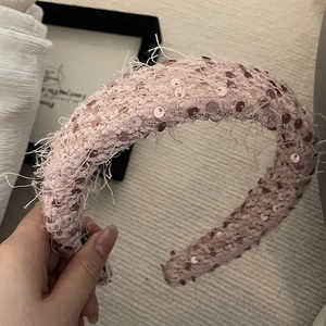 Pink sequin wool headband with wide padded design for an elegant vintage hair look